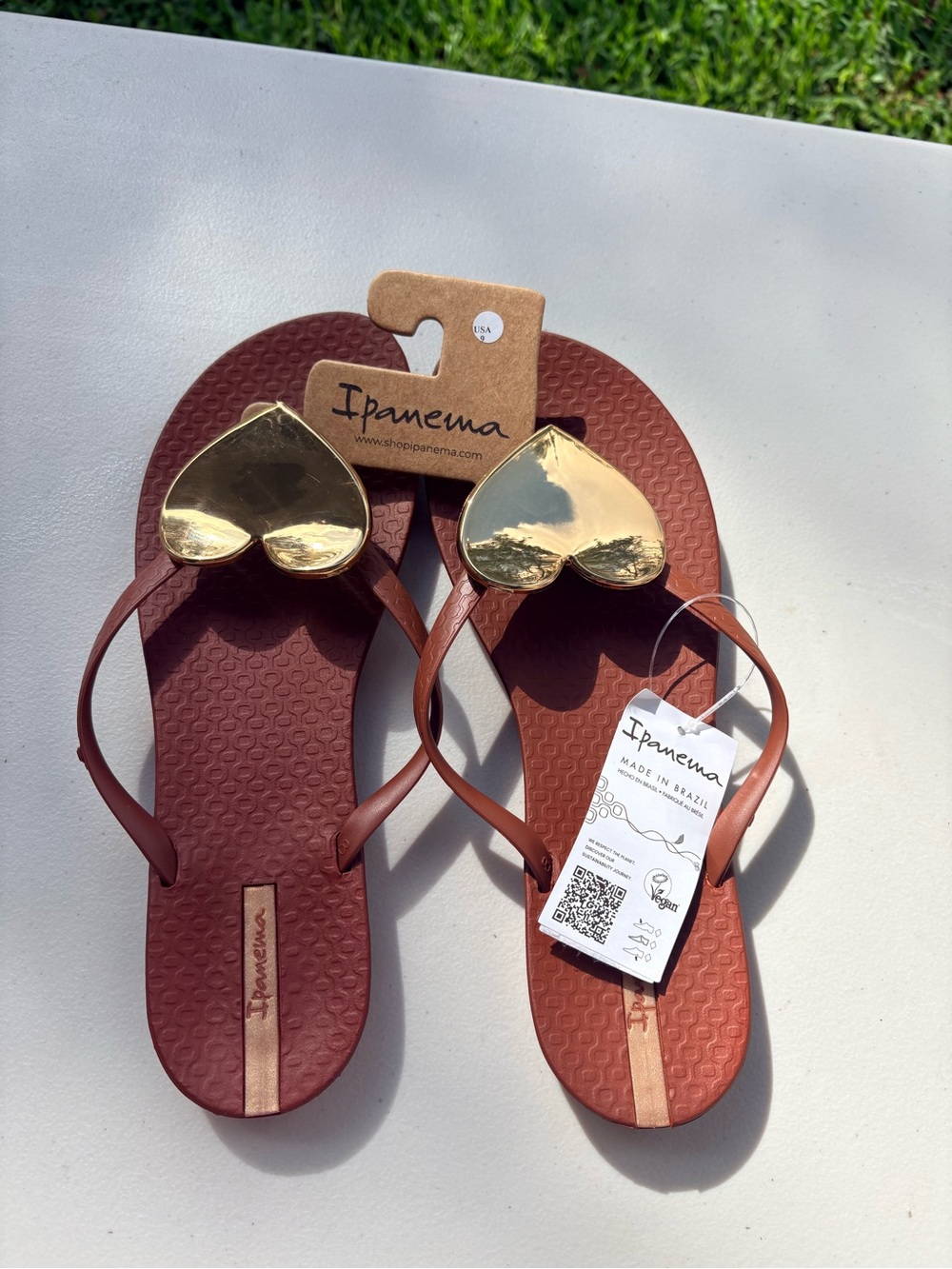 Ipanema Chestnut Flip Flops with Gold Heart Embellishment